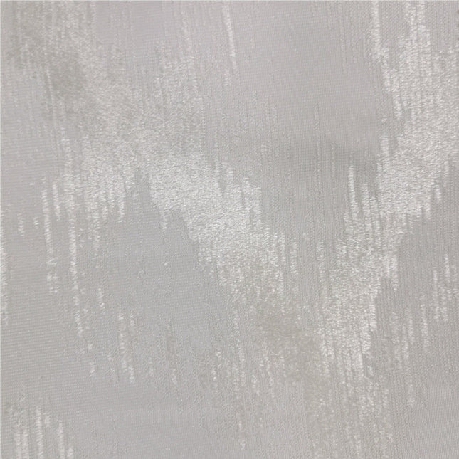 Teksturoitu harmaanruskea pimennysverho makuuhuoneeseen