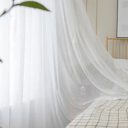 Valoverho kauniilla pilkkukuviolla