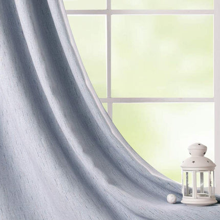 Yksivärinen pimennysverho kudotulla pinnalla