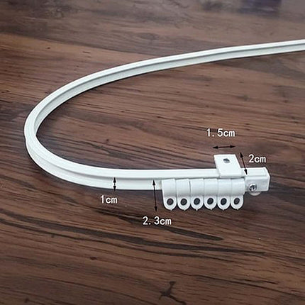 Taipuisa verhokisko kaareville seinille