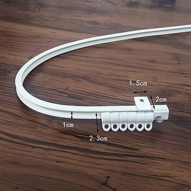 Taipuisa verhokisko kaareville seinille