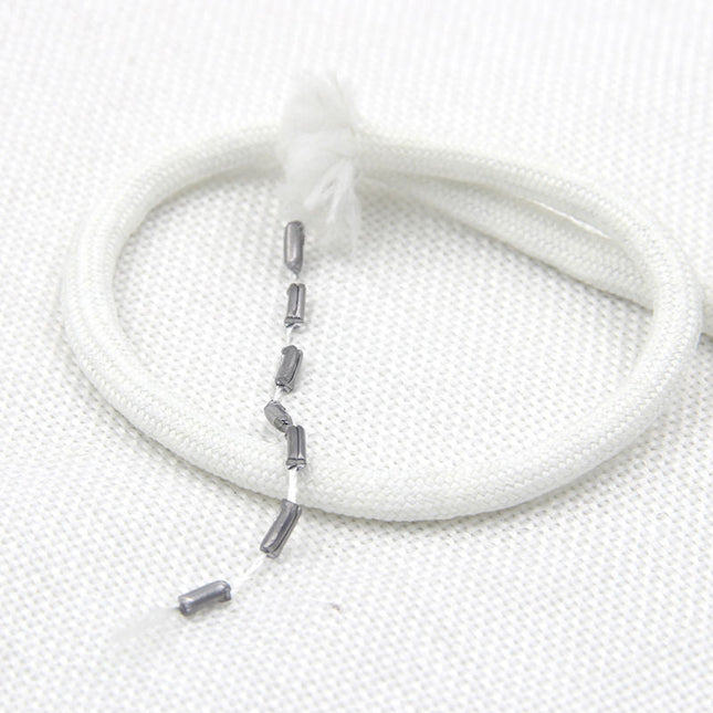 Painonauha verhojen helmaan ompeluun