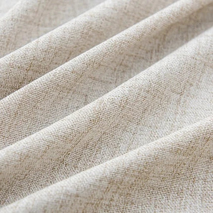 Beige valoverho koristeellisella alareunalla