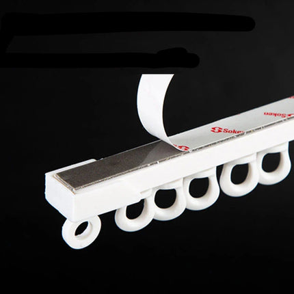 Itseliimautuva verhokisko ilman poraamista