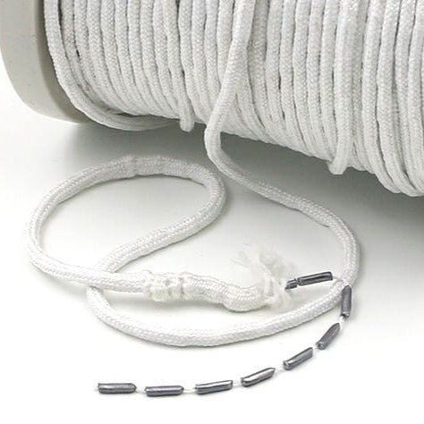 Painonauha verhojen helmaan ompeluun