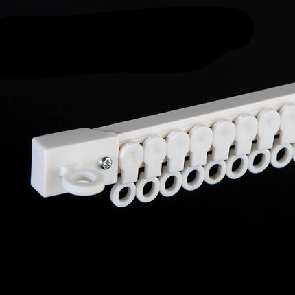 Itseliimautuva verhokisko ilman poraamista