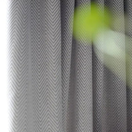 Vaaleanharmaa pimennysverho kalanruotokuviolla