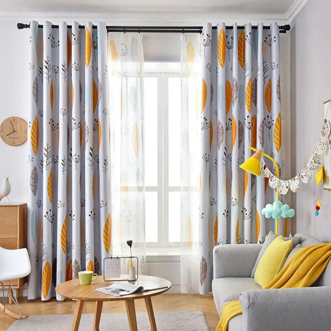 Keltainen lehtikuvioinen läpikuultava verho