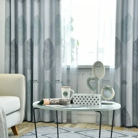 Valoverho tyylitellyllä lehtikuviolla