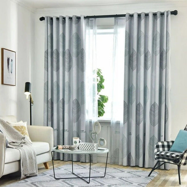 Valoverho tyylitellyllä lehtikuviolla