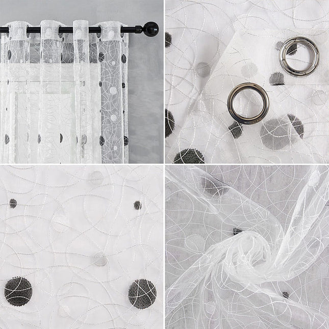 Valkoinen valoverho mustalla kuviolla