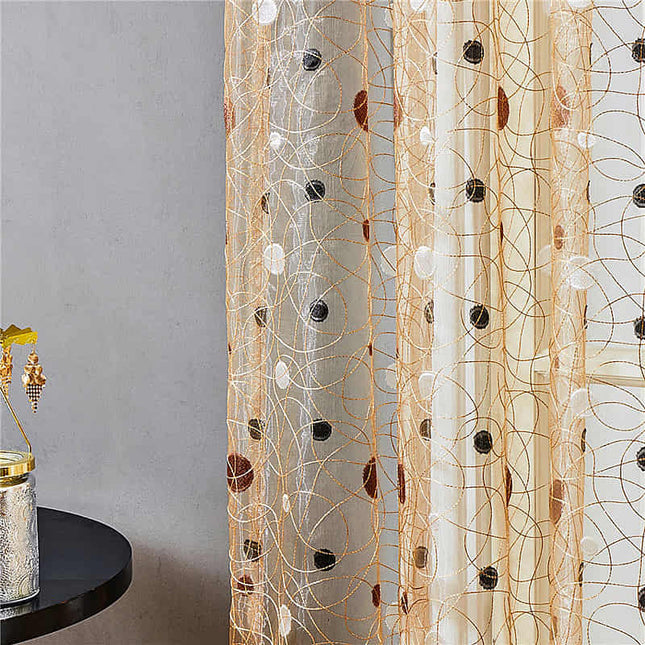 Ruskea kuviollinen valoverho luontoaiheella