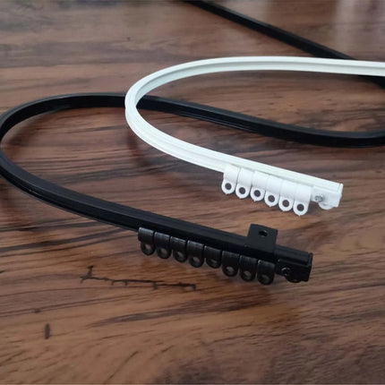 Taipuisa verhokisko kaareville seinille