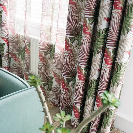 Värikäs trooppinen valoverho lehtikuviolla