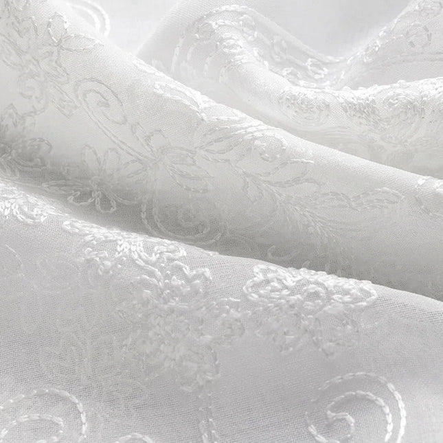 Klassinen valoverho beigellä damaskikuviolla