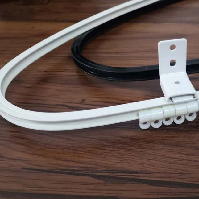 Taipuisa verhokisko kaareville seinille