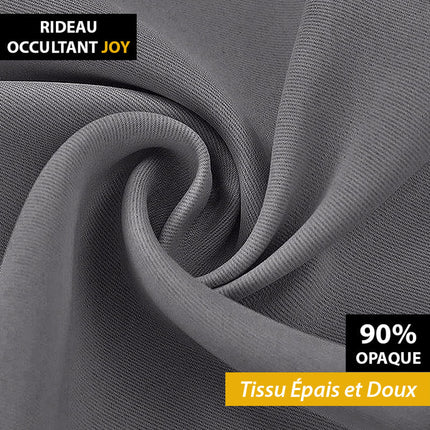 Tyylikäs tummanharmaa pimennysverho makuuhuoneeseen