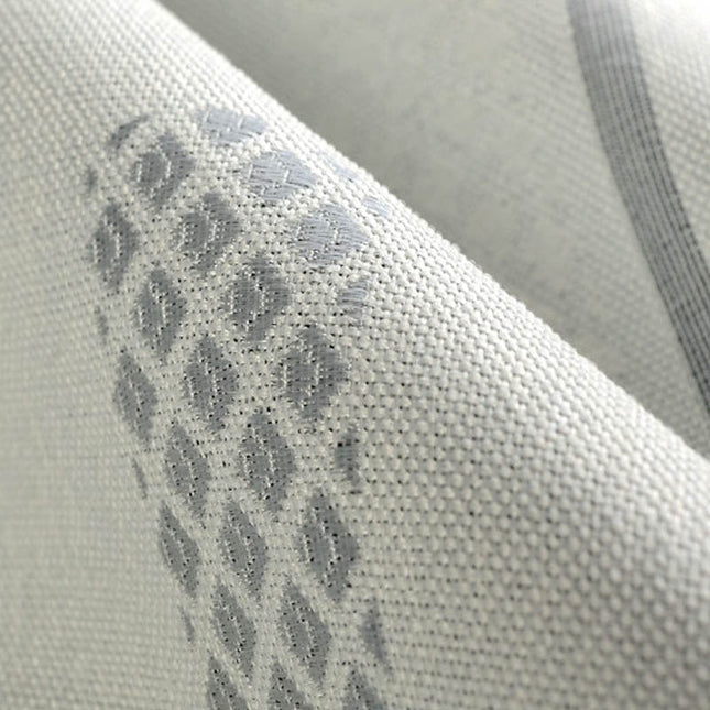 Harmaa pimennysverho graafisella kuviolla